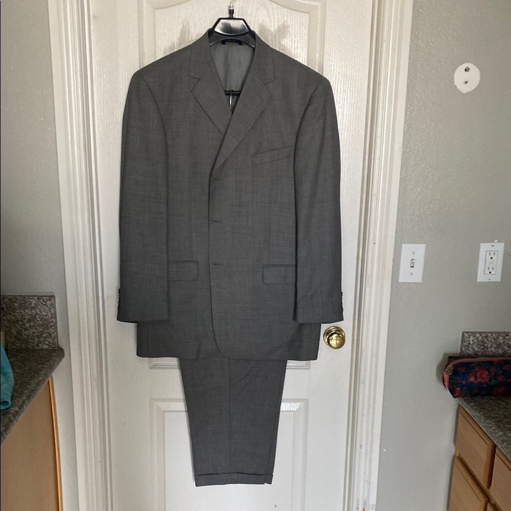 Men's Gray Suit jacket is 48R and pants 38/30